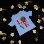 Girls Sky Blue Cotton Knit T-shirt with 'LOVE' Strawberry Graphic Print